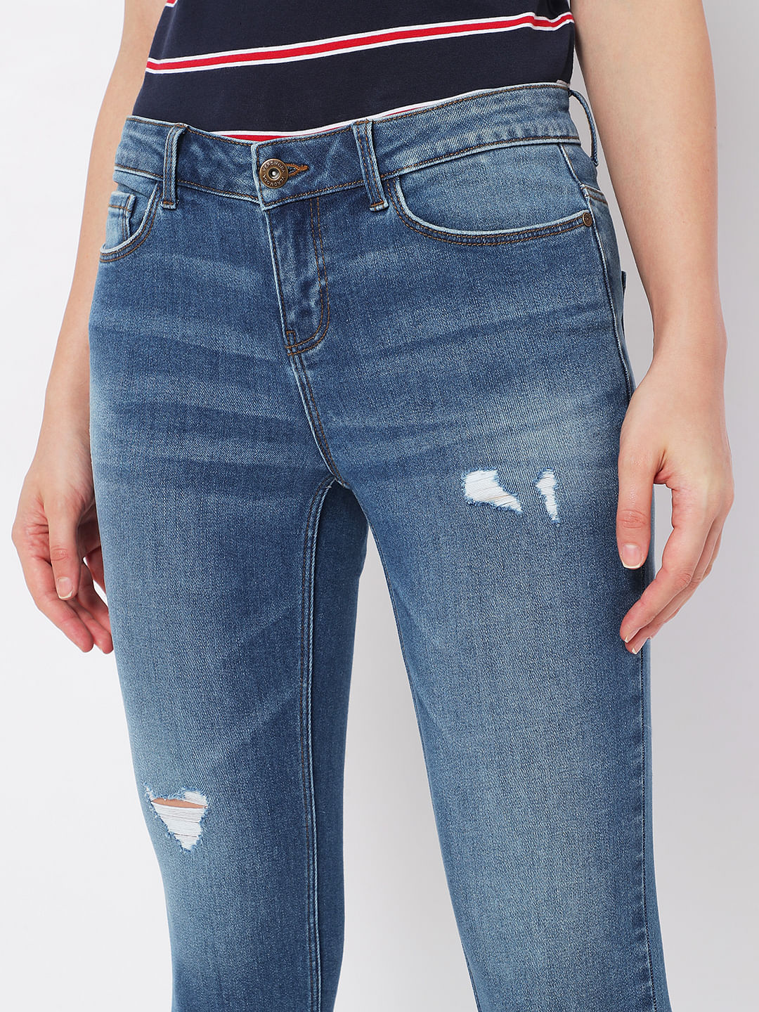 Light Blue Mid Rise Distressed Wendy Skinny Jeans