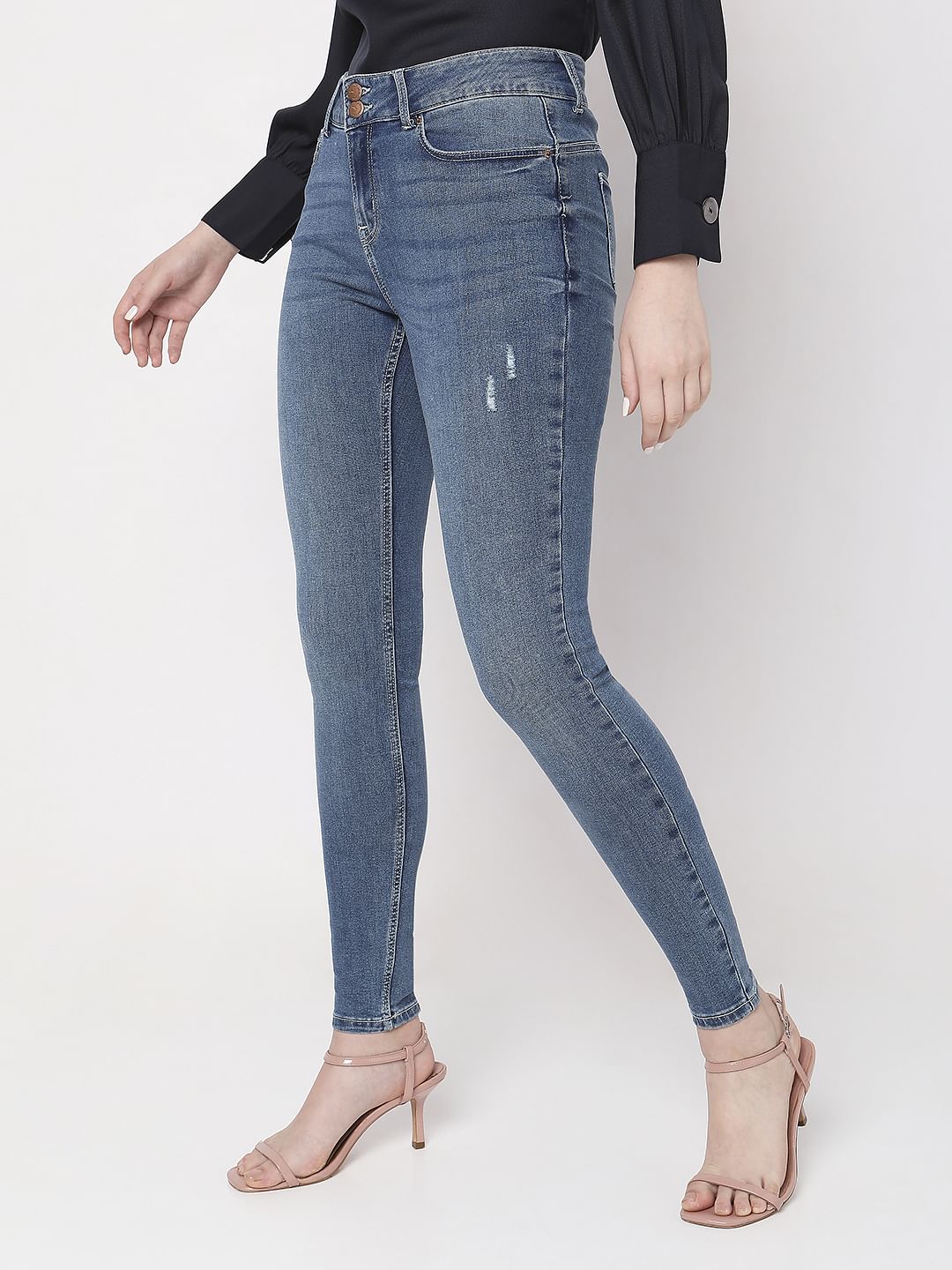 Blue Mid Rise Mildly Distressed Slim Jeans
