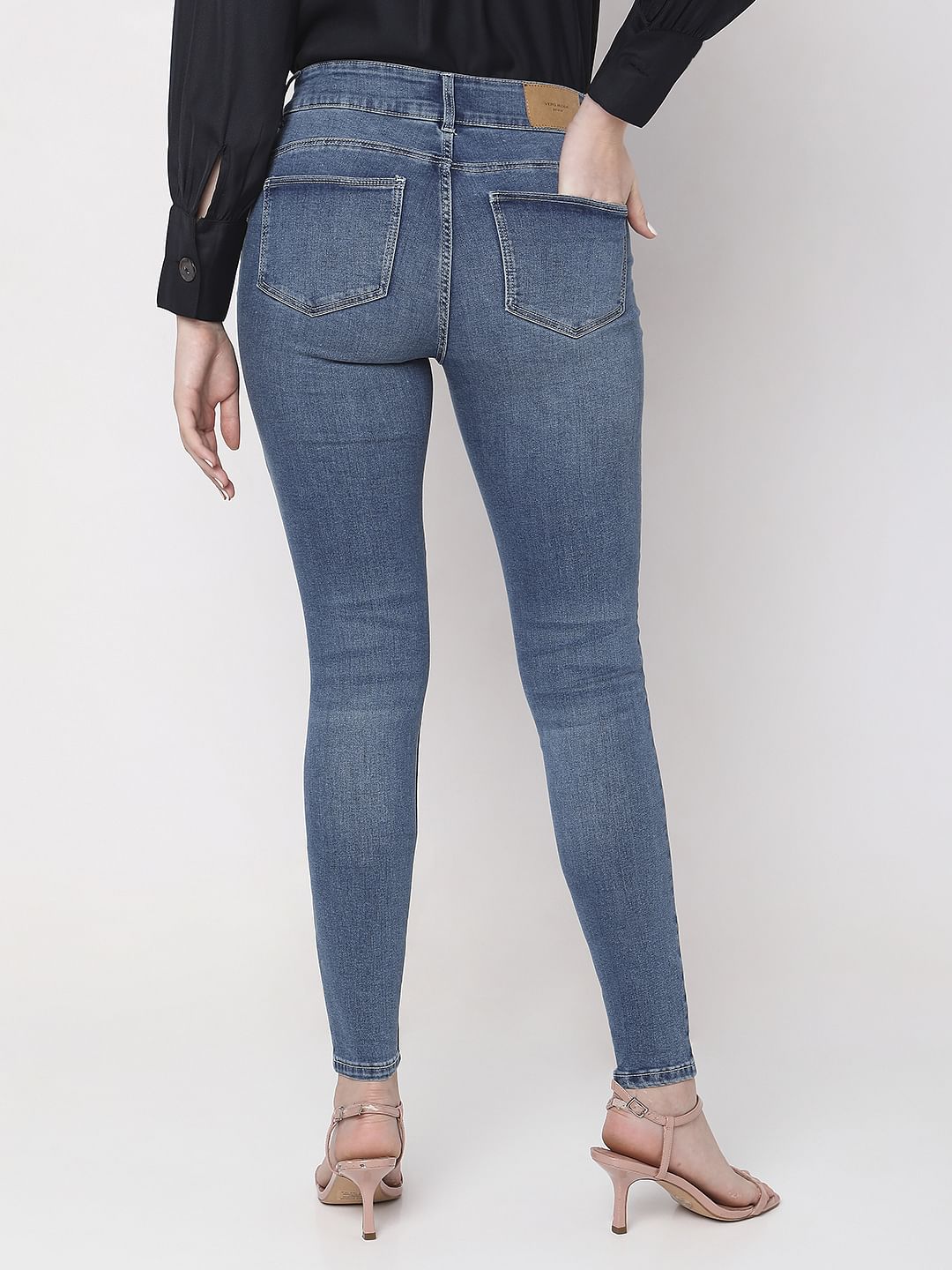 Blue Mid Rise Mildly Distressed Slim Jeans