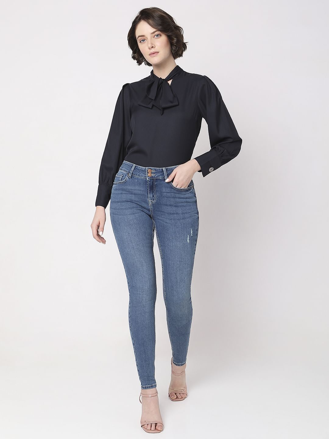 Blue Mid Rise Mildly Distressed Slim Jeans